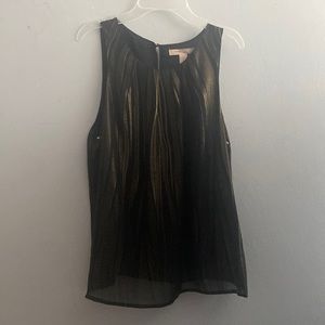 Black and gold fluid tank